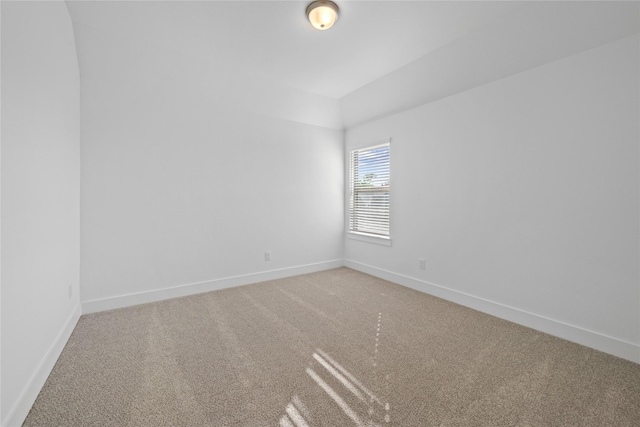 32646 Fly Fish Way, Fulshear, TX 77441 - unfurnished room featuring baseboards, light colored carpet, and vaulted ceiling