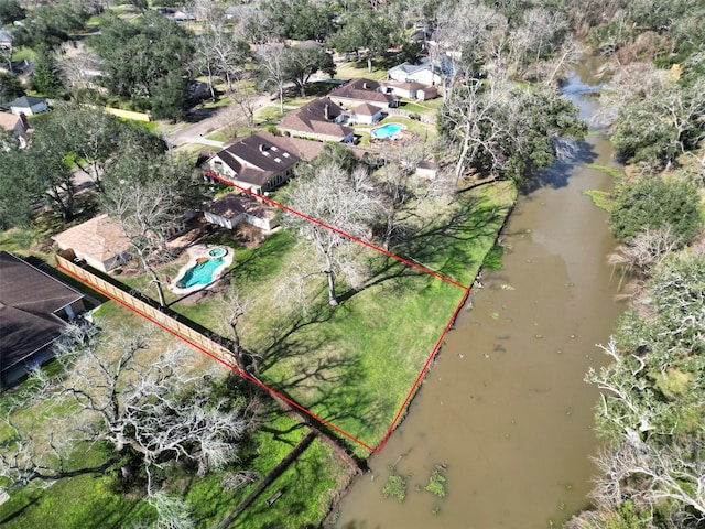 birds eye view of property featuring a water view