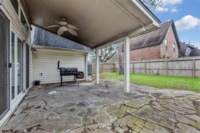 view of patio / terrace with area for grilling and ceiling fan