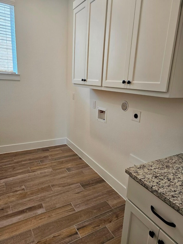 32650 Fly Fish Way, Fulshear, TX 77441 - washroom featuring baseboards, electric dryer hookup, and dark wood-type flooring