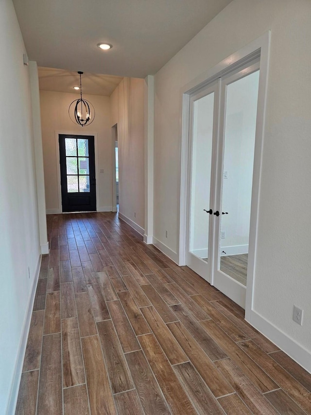 32650 Fly Fish Way, Fulshear, TX 77441 - entryway featuring dark wood-style flooring, a chandelier, french doors, recessed lighting, and baseboards