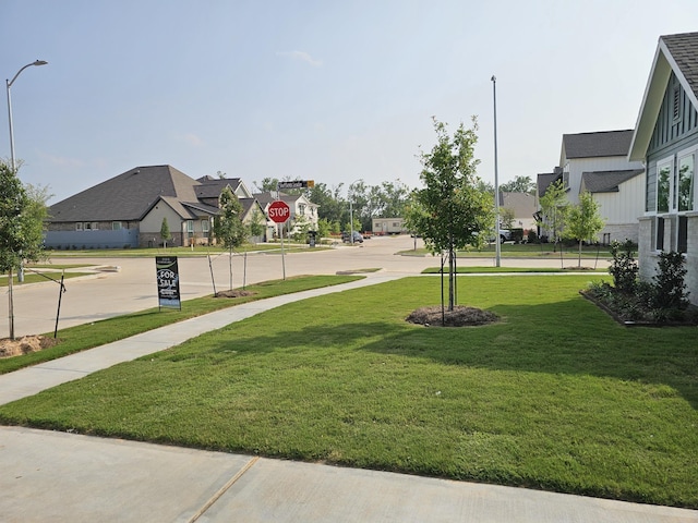 32650 Fly Fish Way, Fulshear, TX 77441 - view of grassy yard featuring a residential view