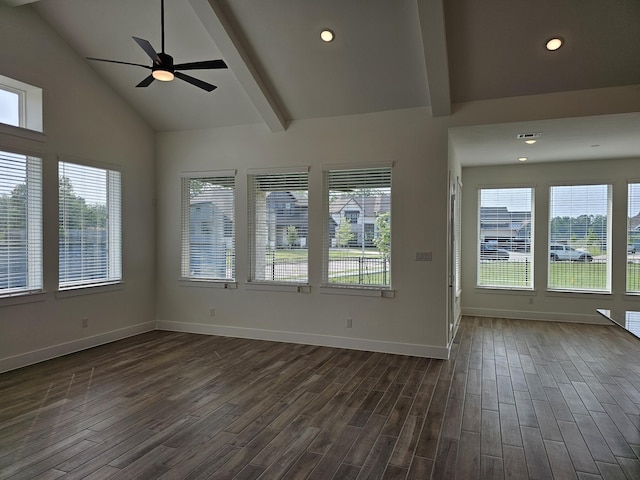 32650 Fly Fish Way, Fulshear, TX 77441 - empty room featuring plenty of natural light, ceiling fan, beam ceiling, dark wood finished floors, and baseboards