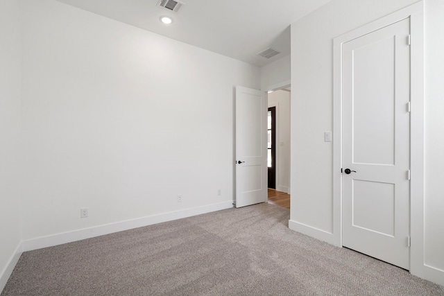 32650 Fly Fish Way, Fulshear, TX 77441 - unfurnished bedroom featuring light carpet and recessed lighting