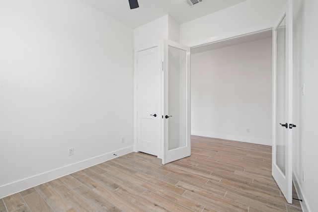 32650 Fly Fish Way, Fulshear, TX 77441 - unfurnished bedroom with light wood-style floors and ceiling fan