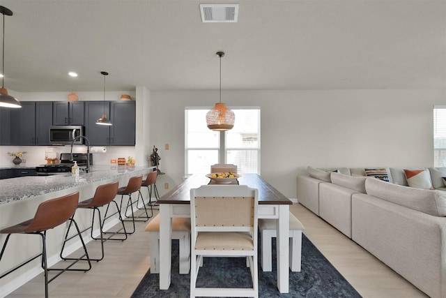 dining area featuring light hardwood / wood-style floors