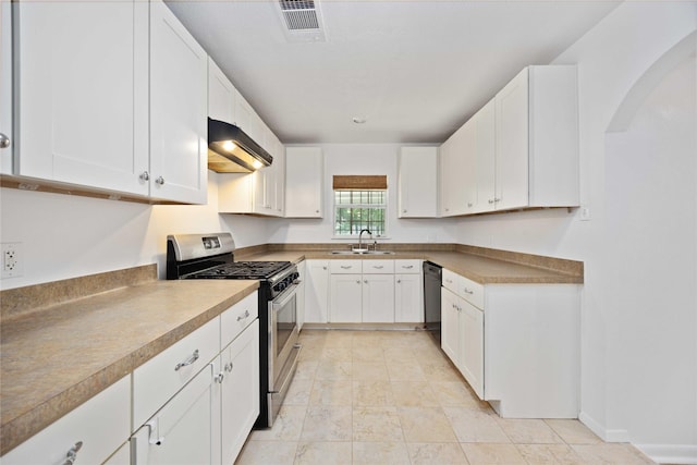 kitchen with sink, white cabinetry, dishwasher, and stainless steel range with gas stovetop