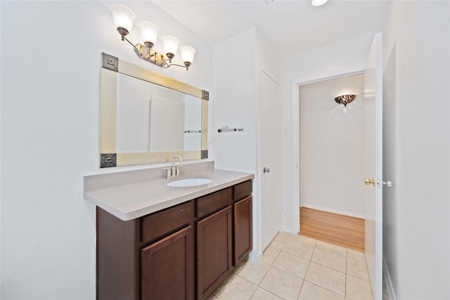 bathroom featuring tile patterned flooring and vanity