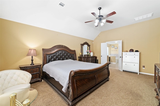 bedroom featuring lofted ceiling, baseboards, light carpet, and visible vents