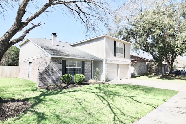 view of front of property with a garage and a front yard