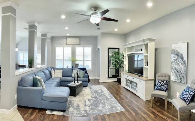 living room with ceiling fan, recessed lighting, dark wood-style flooring, baseboards, and ornate columns