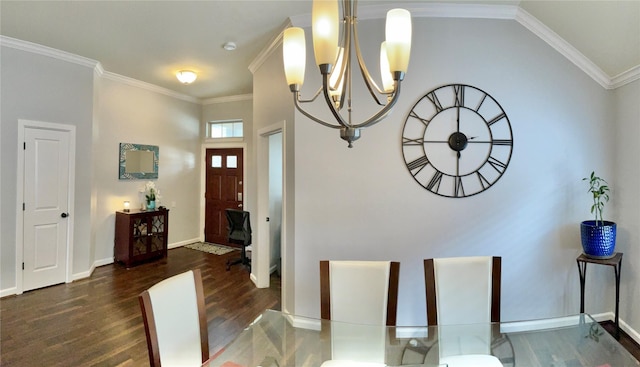 dining room featuring dark wood-style floors, a notable chandelier, crown molding, and baseboards