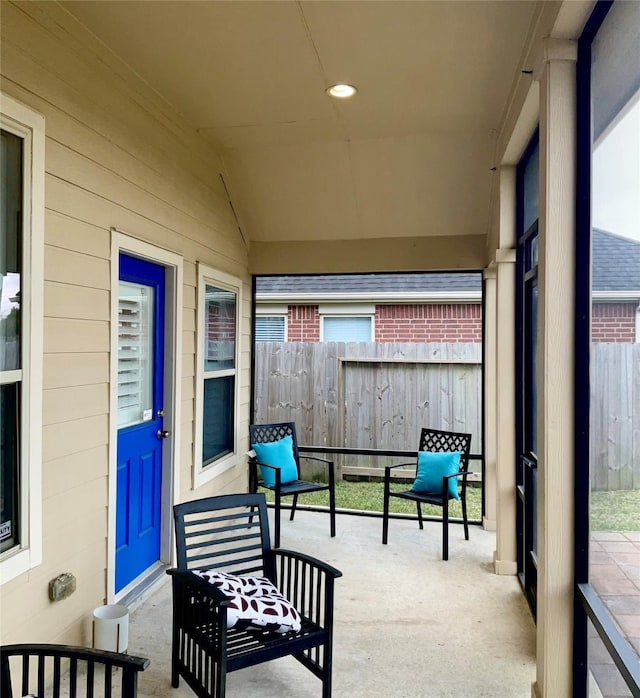 view of patio featuring fence