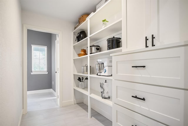 mudroom featuring baseboards