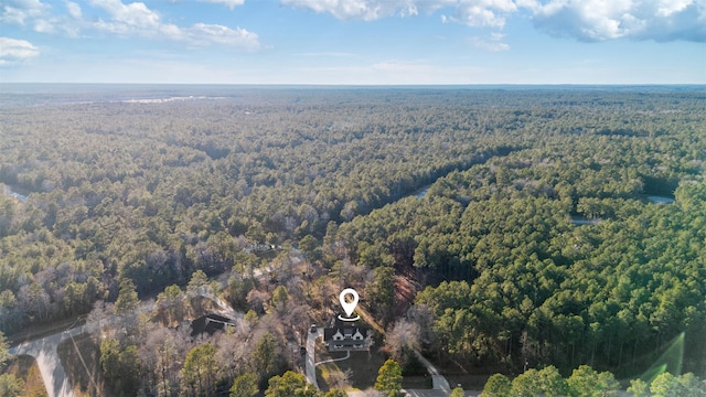 bird's eye view featuring a view of trees