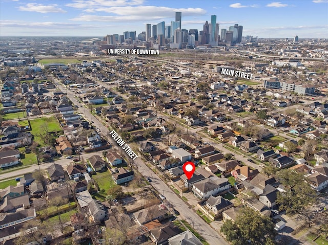 birds eye view of property featuring a city view