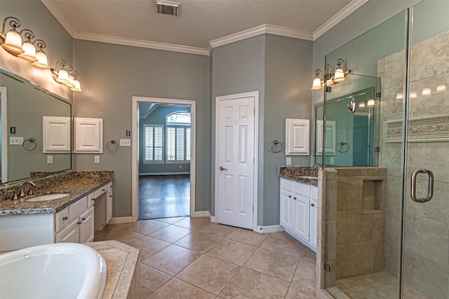 full bathroom with crown molding, two vanities, visible vents, a sink, and tile patterned floors