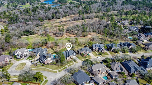 aerial view with a water view and a residential view