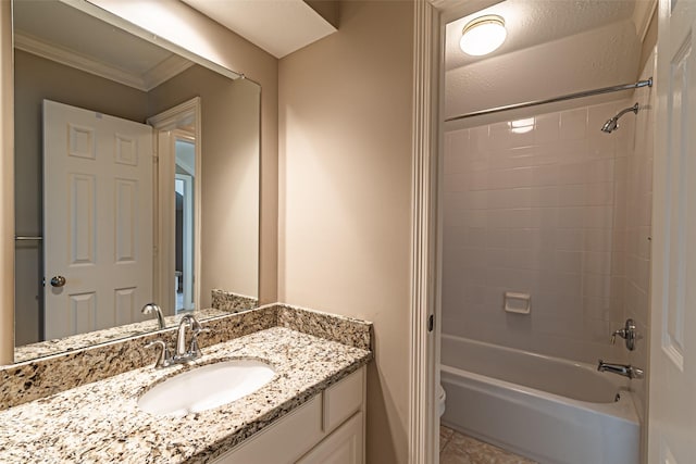 full bathroom featuring ornamental molding, shower / bath combination, tile patterned flooring, and vanity