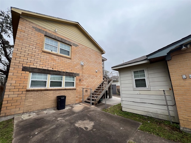 back of property with a patio area