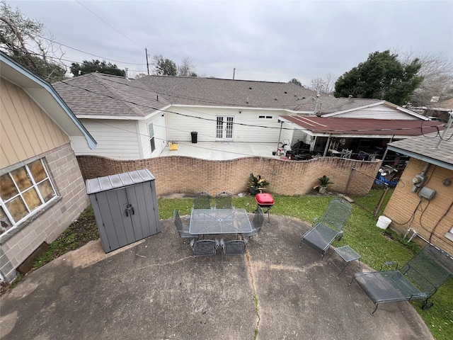 rear view of property featuring a patio area