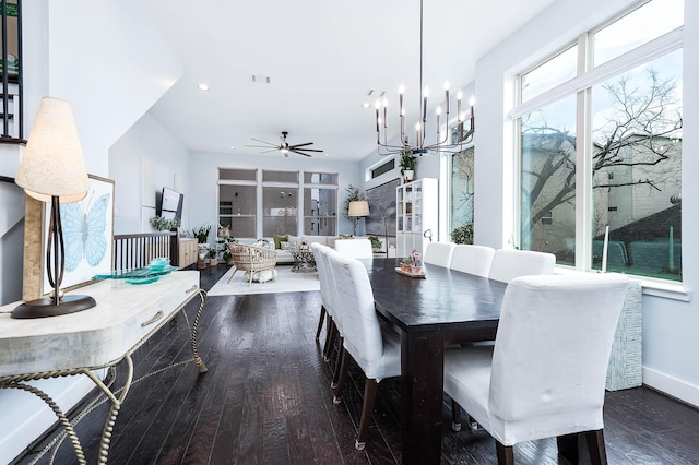 dining area with wood finished floors, recessed lighting, visible vents, and ceiling fan with notable chandelier