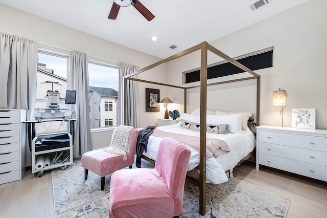 bedroom with visible vents, ceiling fan, light wood finished floors, and recessed lighting