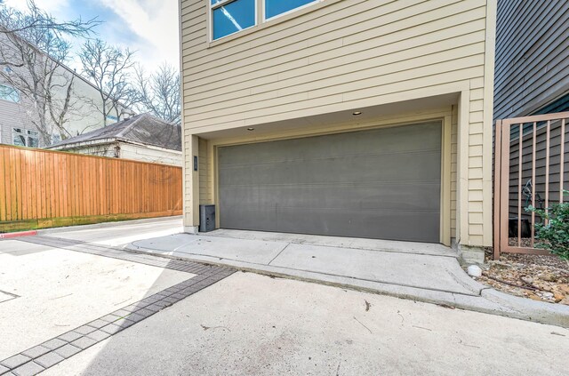 garage with fence