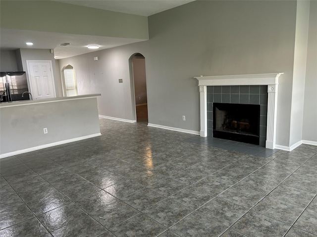 unfurnished living room with a fireplace