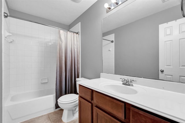 full bathroom with tile patterned flooring, vanity, shower / bathtub combination with curtain, and toilet