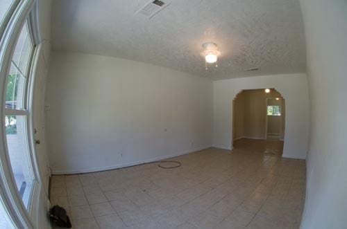 empty room featuring a textured ceiling