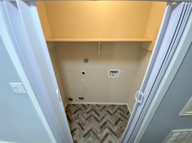 clothes washing area featuring gas dryer hookup, hookup for a washing machine, and electric dryer hookup