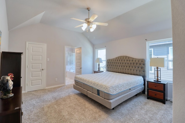 15158 N Heron Heights Way, Magnolia, TX 77354 - carpeted bedroom with connected bathroom, ceiling fan, baseboards, and lofted ceiling