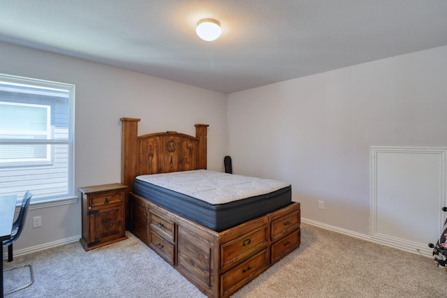 15158 N Heron Heights Way, Magnolia, TX 77354 - bedroom with light colored carpet and baseboards