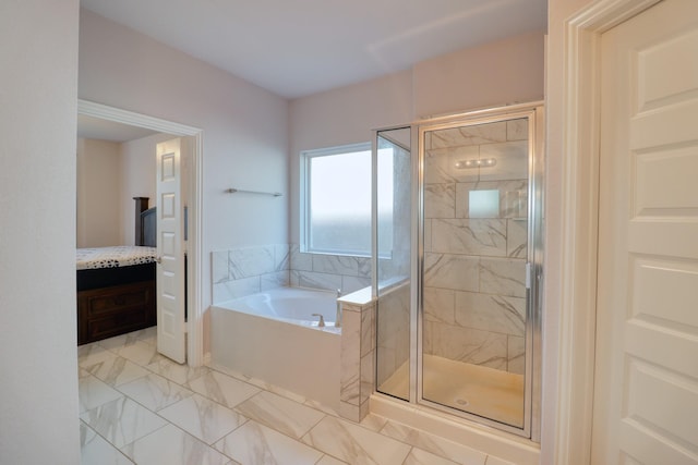 15158 N Heron Heights Way, Magnolia, TX 77354 - bathroom with vanity, marble finish floor, a garden tub, and a stall shower