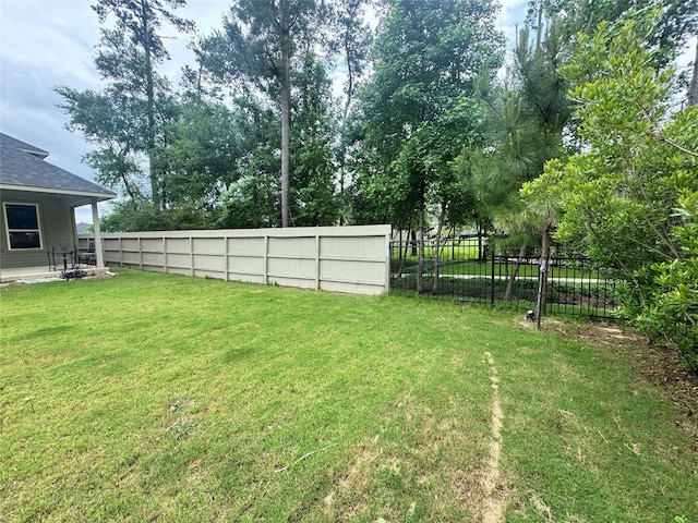 15158 N Heron Heights Way, Magnolia, TX 77354 - view of yard featuring a fenced backyard