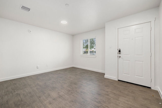 entrance foyer with dark hardwood / wood-style flooring