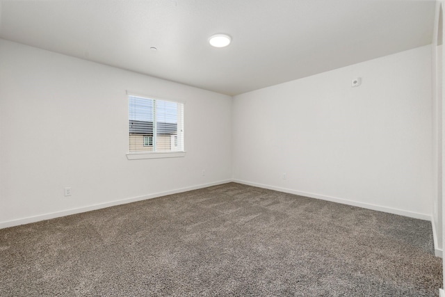 unfurnished room featuring carpet floors