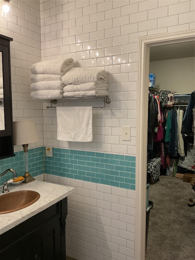 bathroom featuring backsplash and vanity