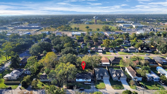 birds eye view of property with a residential view