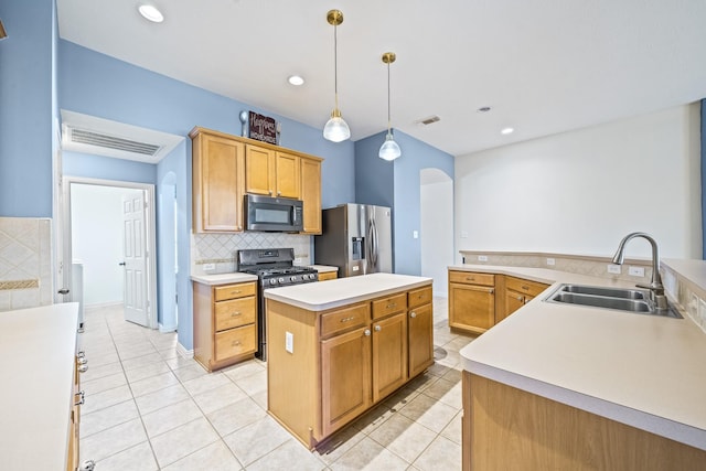 kitchen with range with gas stovetop, a center island, stainless steel refrigerator with ice dispenser, a sink, and black microwave