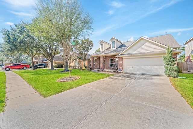 view of front of house with driveway, brick siding, a shingled roof, an attached garage, and a front yard