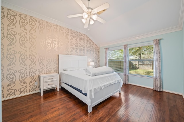 bedroom featuring dark wood-style floors, ornamental molding, vaulted ceiling, baseboards, and wallpapered walls