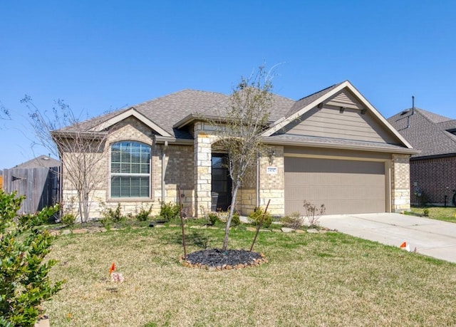 single story home with an attached garage, brick siding, fence, concrete driveway, and a front lawn