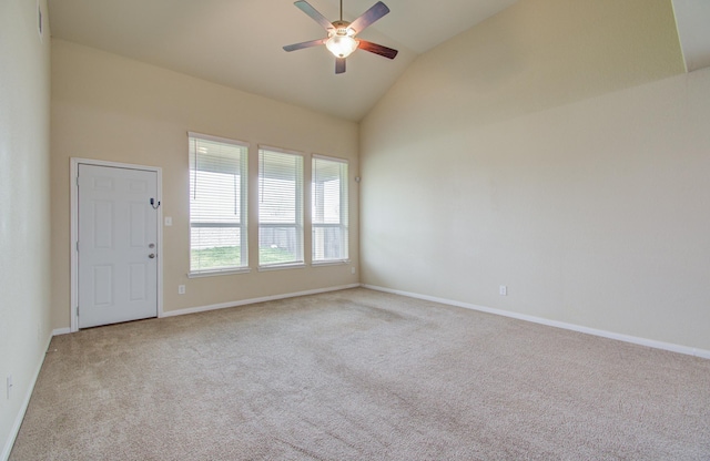 unfurnished room with ceiling fan, light colored carpet, and high vaulted ceiling