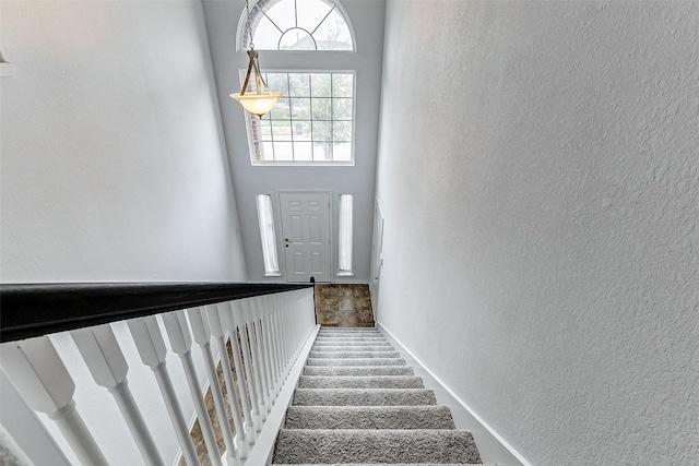 stairway with a high ceiling