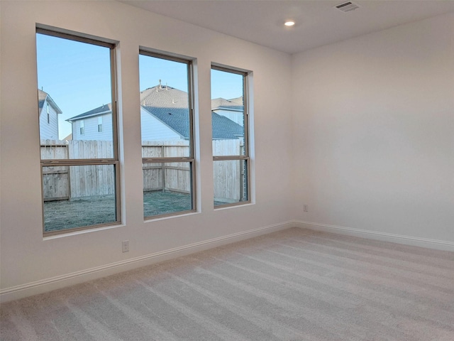 view of carpeted spare room