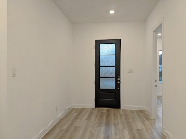 entryway with light hardwood / wood-style flooring