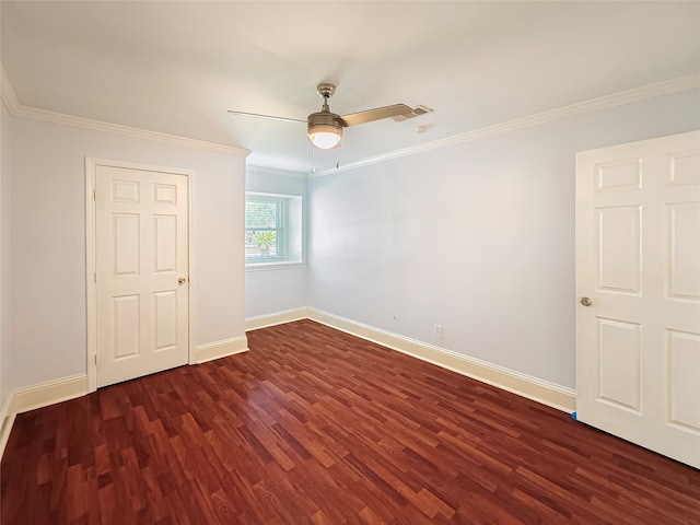 unfurnished bedroom with ceiling fan, ornamental molding, and dark hardwood / wood-style flooring