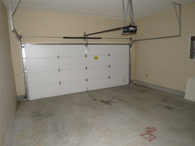 garage featuring a garage door opener